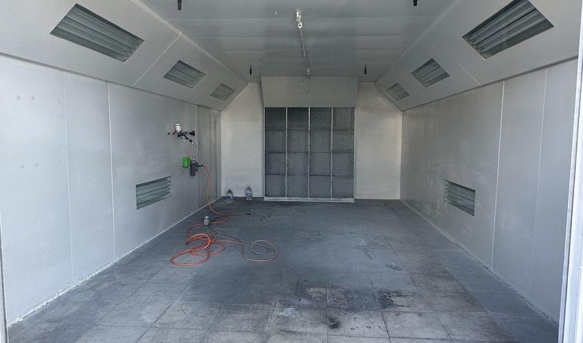 Licensed state-of-the-art spray booth.